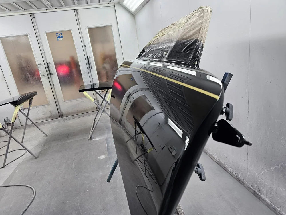 Gloss black panel β booth finish